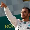 Mercedes Formula One driver Lewis Hamilton of Britain celebrates his victory on the podium after the Australian F1 Grand Prix at the Albert Park circuit in Melbourne