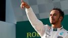 Mercedes Formula One driver Lewis Hamilton of Britain celebrates his victory on the podium after the Australian F1 Grand Prix at the Albert Park circuit in Melbourne Marc