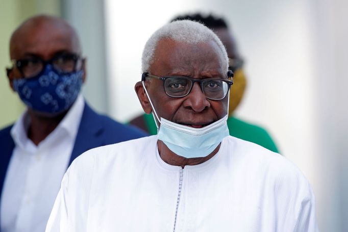 Former President of the International Association of Athletics Federations (IAAF) Lamine Diack, wearing a face mask, leaves after the verdict in his trial at the Paris co