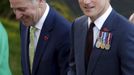 Britain's Prince Harry and New Zealand's Prime Minister John Key arrive at the National War memorial in Wellington