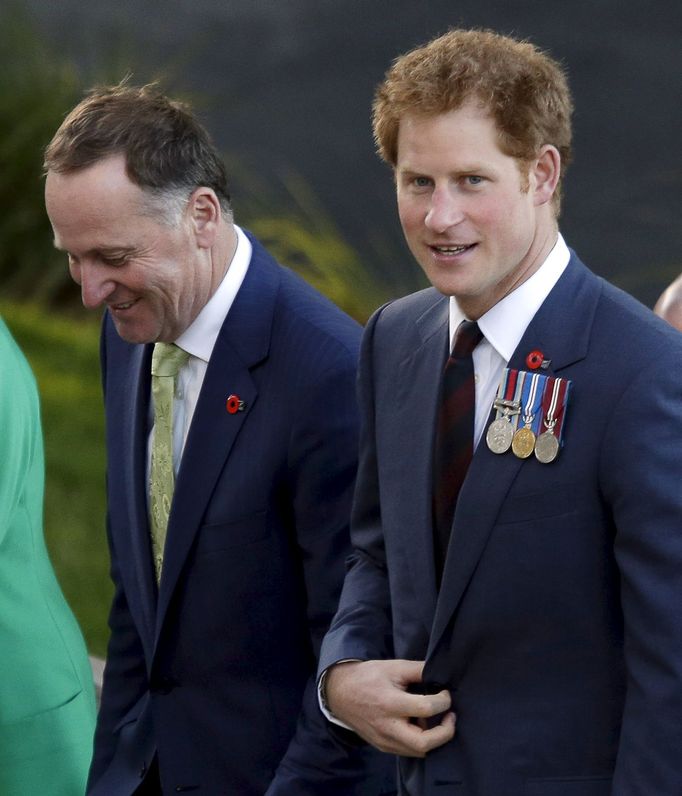 Britain's Prince Harry and New Zealand's Prime Minister John Key arrive at the National War memorial in Wellington