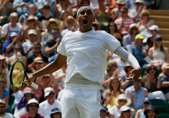 Nick Kyrgios of Australia reacts during his match against Milos Raonic of Canada at the Wimbledon Tennis Championships in London