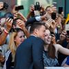 Actor Channing Tatum greets fans as he arrives for the &quot;Foxcatcher&quot; gala at the Toronto International Film Festival
