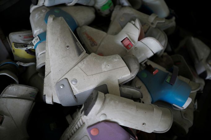 Ski boots lie at an abandoned ski rental shop