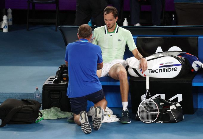 Tennis - Australian Open - Men's Singles Final - Melbourne Park, Melbourne, Australia - January 31, 2022 Russia's Daniil Medvedev receives medical attention during the fi