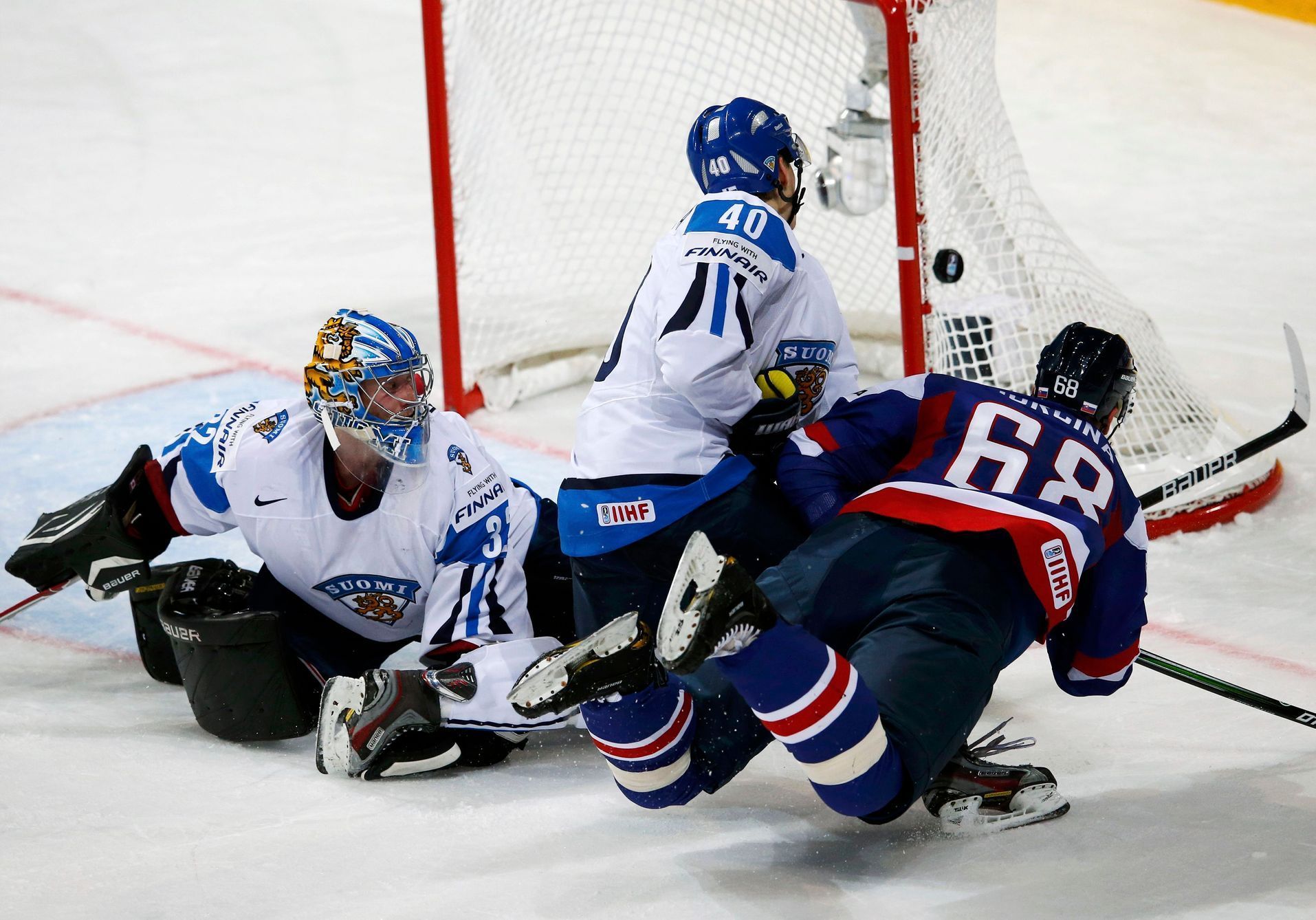 Raanta, Koskiranta a Jurčina v utkání MS 2013