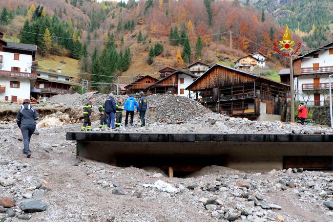 The governor of the Veneto region, Luca Zaia, 2nd from right, checks the devastation left behind after a week of bad weather in the Veneto region, northeastern Italy.