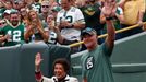 Sep 15, 2019; Green Bay, WI, USA; Former Green Bay Packers quarterback Brett Favre escorts Cherry Starr onto the field prior to the game against the Minnesota Vikings at