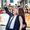 Cast member Dustin Hoffman (waves as he arrives with his wife Lisa for the premiere of the film &quot;Boychoir&quot; at the Toronto International Film Festival (TIFF) in Toronto