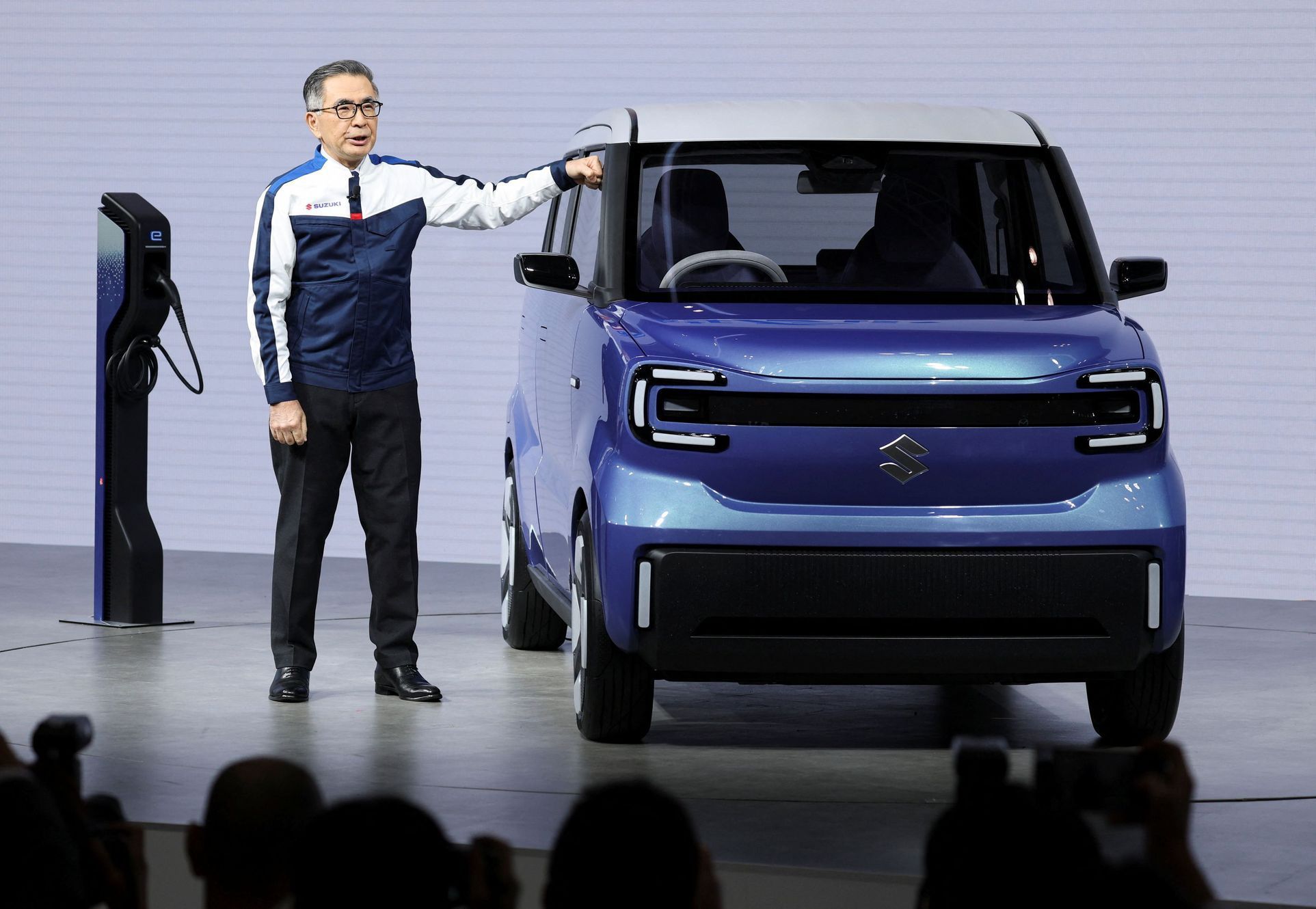 Suzuki Motor President Toshihiro Suzuki holds a press briefing at the Japan Mobility Show 2025 in Tokyo
