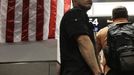 Luis Salgado, nicknamed Chucho, waits in line at U.S. Immigration upon arriving at Miami airport on a direct flight from Havana, March 13, 2013. Chucho was granted a U.S. visa based on his father's status as legal resident in Texas, and he was reunited in Miami with his father, Jesus Salgado, who had escaped Cuba on a frail boat ten years earlier. The Salgados are among many Cubans taking advantage of Cuba's new travel policy in place since last January, which allows citizens to leave the country with just a passport and no need for much-hated exit visas required since 1961. Picture taken March 13, 2013. REUTERS/Desmond Boylan (UNITED STATES - Tags: POLITICS SOCIETY) Published: Dub. 11, 2013, 1:43 odp.