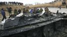 WWII tank raised from riverbed in south Russia VOLGOGRAD REGION, RUSSIA. JANUARY 26, 2011. The remains of a T-34 tank that was involved in the Battle of Stalingrad has been raised from the bed of the Dobraya River, some 100km west of the city of Volgograd (former Stalingrad), three months after its discovery. The tank was buried 4m under the riverbed. The tank, which was hit and sunk in December 1942 while crossing the 14ft deep river, is to be donated as an exhibit to the Battle of Stalingard Museum.