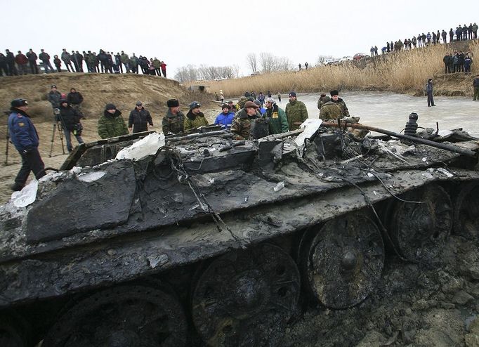 WWII tank raised from riverbed in south Russia VOLGOGRAD REGION, RUSSIA. JANUARY 26, 2011. The remains of a T-34 tank that was involved in the Battle of Stalingrad has been raised from the bed of the Dobraya River, some 100km west of the city of Volgograd (former Stalingrad), three months after its discovery. The tank was buried 4m under the riverbed. The tank, which was hit and sunk in December 1942 while crossing the 14ft deep river, is to be donated as an exhibit to the Battle of Stalingard Museum.