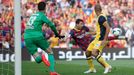 Atletico Madrid's goalkeeper Courtois watches as Barcelona's Messi kicks to score a goal that was later disallowed during their Spanish first division match in Barcelona