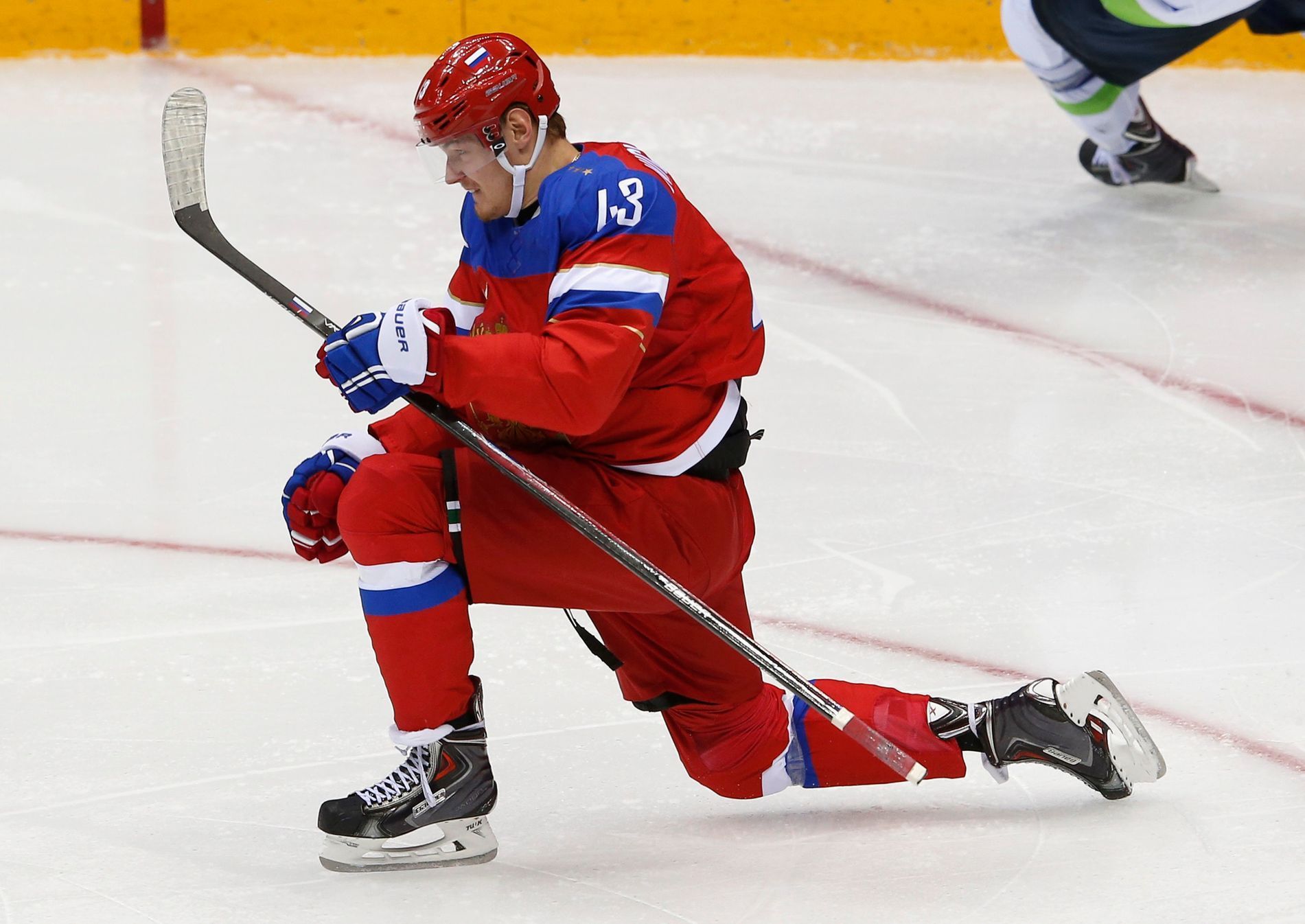 Russia's Valeri Nichushkin celebrates after scoring during the third period of their men's preliminary round ice hockey game against Slovenia at the Sochi 2014 Winter Olympic Games