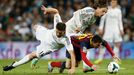 Barcelona's Messi and Real Madrid's Alonso and Modric challenge for ball during La Liga's second 'Clasico' soccer match of the season in Madrid