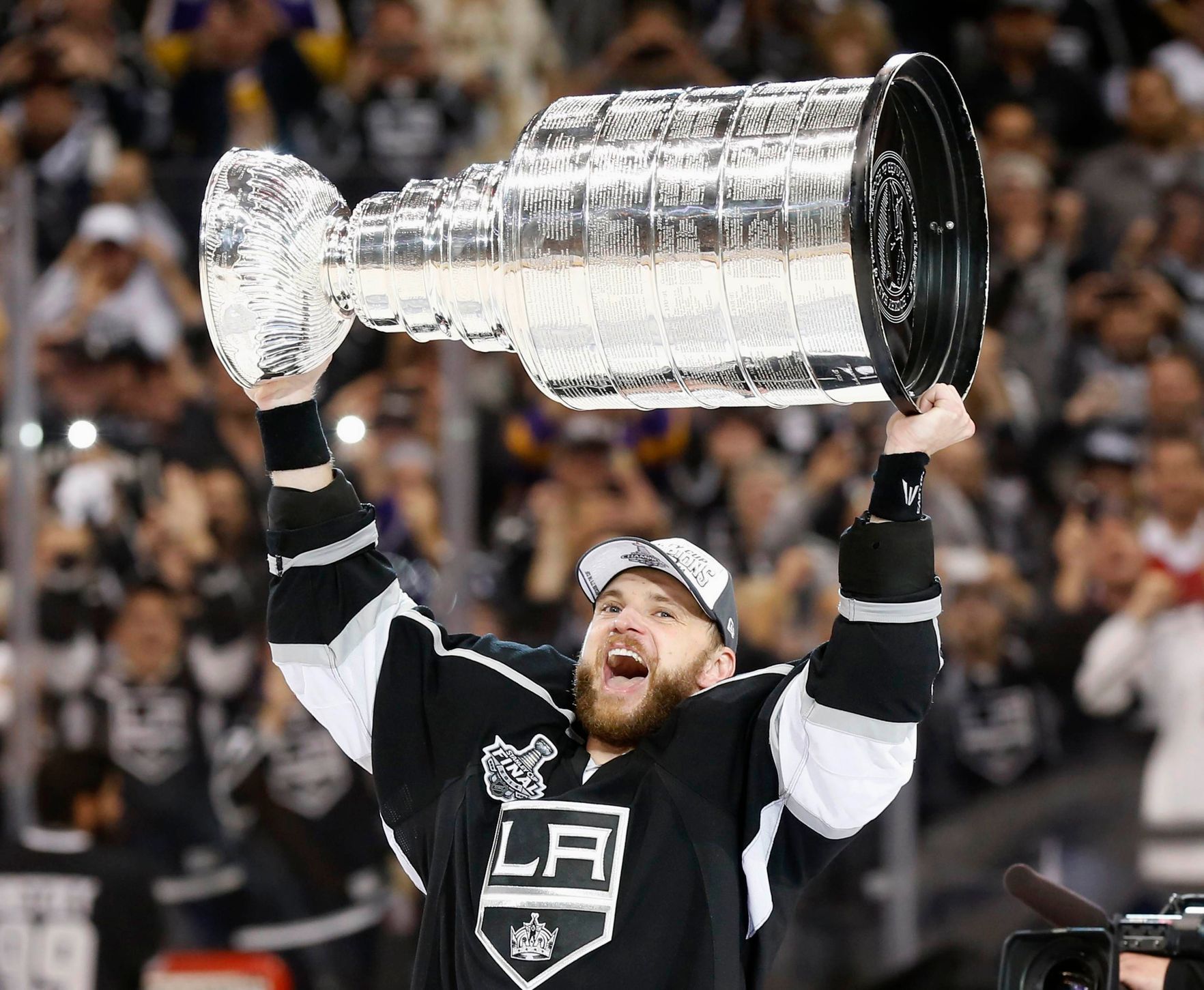 Los Angeles Kings' Marian Gaborik celebrates with the Stanley Cup after NHL Stanley Cup Finals in Los Angeles
