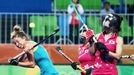 Women's Pool B Australia v Japan - Olympic Hockey Centre - Rio de Janeiro, Brazil - 13/08/2016. Brooke Peris (AUS) of Australia (L) competes with Mie Nakashima (JPN) of J