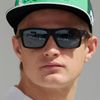 Caterham Formula One driver Marcus Ericsson of Sweden looks on during the first practice session of the Bahrain F1 Grand Prix at the Bahrain International Circuit (BIC) in Sakhir