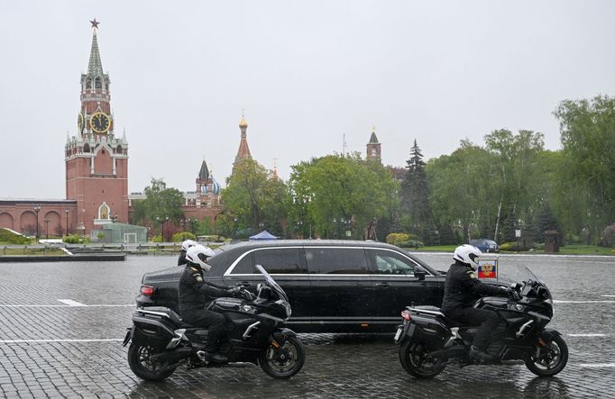 The Aurus Senate limousine carrying Russian President Vladimir Putin and Aurus Merlon bikes drive prior to an inauguration ceremony at the Kremlin in Moscow, Russia May 7