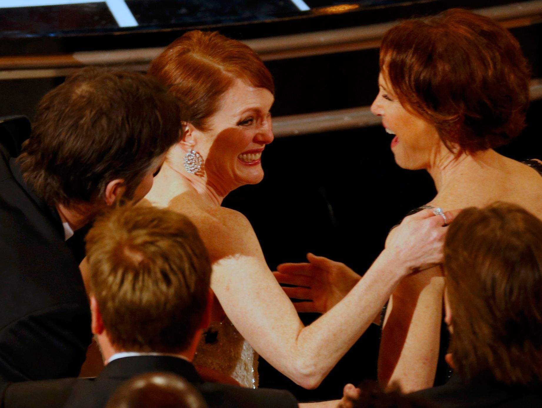 Julianne Moore reacts after winning the Oscar for Best Leading Actress for her role in &quot;Still Alice&quot; at the 87th Academy Awards in Hollywood, California