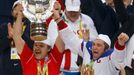 Russia's head coach Oleg Znarok (L) and Alexander Ovechkin celebrate with the trophy after winning their men's ice hockey World Championship final game against Finland at