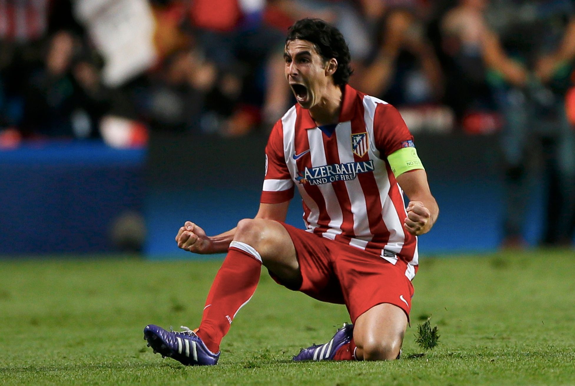 Atletico Madrid's Tiago celebrates the goal of team mate Lopez against Chelsea during their Champions League semi-final second leg soccer match at Stamford Bridge stadium in London