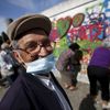 Hugo, 85, poses for a portrait during a graffiti class offered by the LATA 65 organization in Lisbon