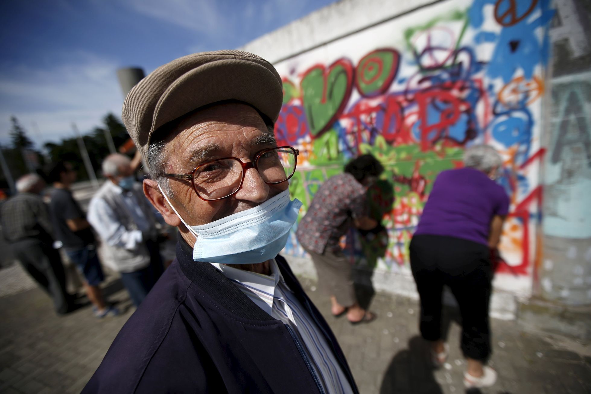 Hugo, 85, poses for a portrait during a graffiti class offered by the LATA 65 organization in Lisbon