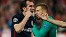 Atletico's Diego Godin appeals to the referee Nicola Rizzoli