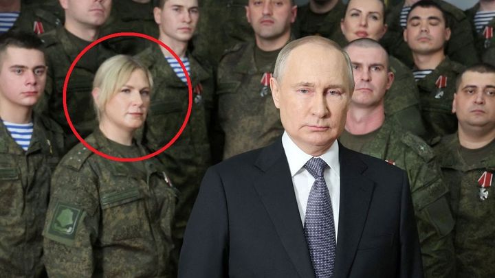 Putinova tajemná žena. Silvestrovský projev rozvířil spekulace o vojačce z videa; Zdroj foto: Reuters