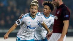 Schalke 04's Geis celebrates with his teammate Sane after scoring a goal against Sparta Prague during their Europa League soccer match in Prague