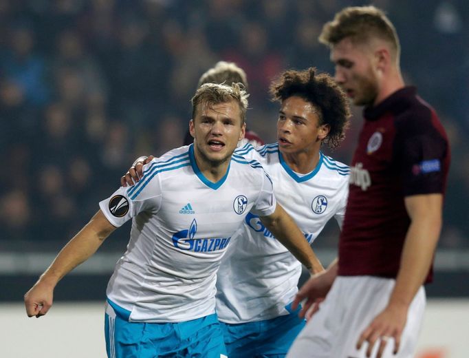 Schalke 04's Johannes Geis (L) celebrates with his teammate Leroy Sane after scoring a goal against Sparta Prague during their Europa League soccer match in Prague, Czech