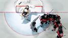 Canada's players celebrate a goal past Germany's goaltender Dennis Endras (L) during their Ice Hockey World Championship game at the O2 arena in Prague, Czech Republic Ma