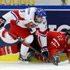 Czech Republic's Vrana checks Canada's Gauthier during the first period of their IIHF World Junior Championship ice hockey game in Malmo