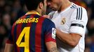 Real Madrid's Pepe touches the neck of Barcelona's Cesc Fabregas during La Liga's second 'Clasico' soccer match of the season in Madrid