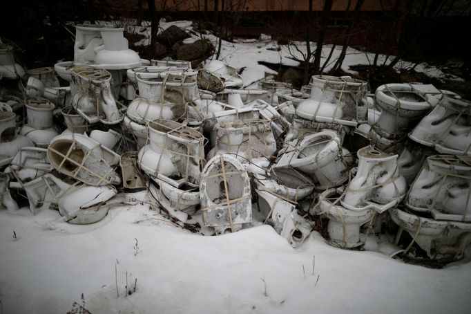 Toilets are piled up at the abandoned Alps Ski Resort