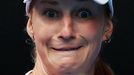 Ekaterina Makarova of Russia eyes the ball as she prepares to hit a return to Simona Halep of Romania during their women's singles quarter-final at the Australian Open 20