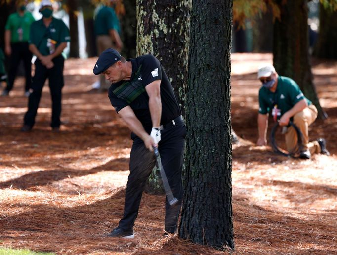 Golf - The Masters - Augusta National Golf Club - Augusta, Georgia, U.S. - November 12, 2020 Bryson DeChambeau of the U.S. plays out of the woods on the 13th during the f