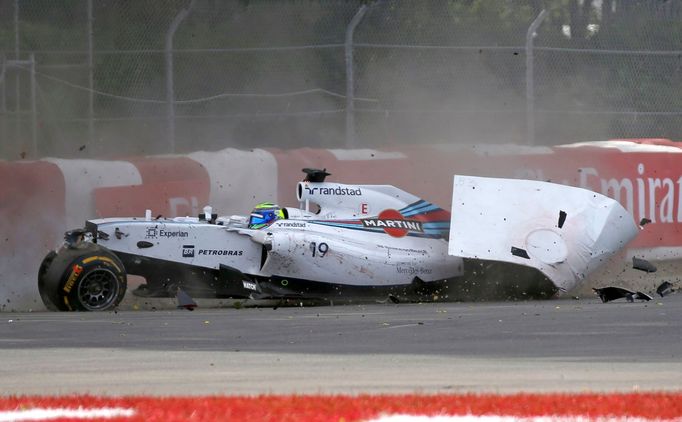 Williams Formula One driver Felipe Massa of Brazil crashes during the Canadian F1 Grand Prix at the Circuit Gilles Villeneuve in Montreal June 8, 2014. REUTERS/Mathieu Be