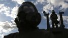 Brazilian army soldiers wearing chemical suits participate in an anti-terror simulation exercise as part of the preparation for the upcoming 2013 FIFA Confederations Cup in Brasilia. May 22, 2013. About 100 soldiers took part in the exercise which include preventive strikes against chemical, biological and radiological weapons conducted around Mane Garrincha National Stadium, according to an official statement. REUTERS/Ueslei Marcelino (BRAZIL - Tags: SPORT SOCCER MILITARY TPX IMAGES OF THE DAY) Published: Kvě. 22, 2013, 9:47 odp.