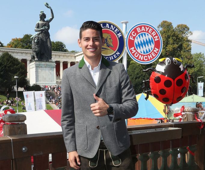 FC Bayern Munich's Rodriguez poses during their visit at the Oktoberfest in Munich