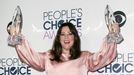 Melissa McCarthy poses backstage with her awards during the People's Choice Awards 2016 in Los Angeles