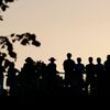 Spectators watch at the Wimbledon Tennis Championships in London