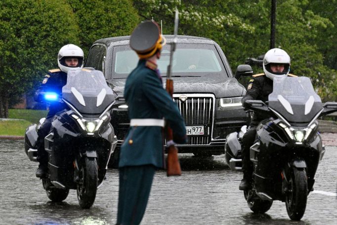 The Aurus Senate limousine carrying Russian President Vladimir Putin and Aurus Merlon bikes drive prior to an inauguration ceremony at the Kremlin in Moscow, Russia May 7