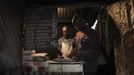 Denis Onyango Olang, (R), a 26 year-old assistant cook, prepares food in a dimly lit kitchen at a hotel in Nairobi's Kibera slum in the Kenyan capital April 30, 2012. Onyango Olang studied statistics and chemistry at Jomo Kenyatta University of Agriculture and Technology where he received a degree in science. He has been searching for permanent employment for two years but has decided to make a living working in the slums for the last eight months.