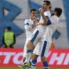 Greece's Karagounis celebrates with his teamates after scoring against Liechtenstein during the 2014 World Cup qualifying soccer match in Piraeus near Athens