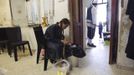 Esther Kreus, 13, peels potatoes during her family's preparations for the Jewish Sabbath in Jerusalem's Mea Shearim neighbourhood June 29, 2012.The Kreus family are a member of Neturei Karta, a fringe ultra-Orthodox movement within the anti-Zionist bloc. The ultra-Orthodox Jews have gone from being a tiny minority in Israel's mostly secular society to its fastest-growing sector, now about 10 percent of the 7.8 million population. They are exempt from military duty in Israel but draft deferments and state subsidies for the ultra-Orthodox have become a divisive political issue in Israel, where the government must decide a new law by August to ensure more of them do military service. Picture taken June 29, 2012. REUTERS/Ronen Zvulun (JERUSALEM - Tags: RELIGION POLITICS FOOD) ATTENTION EDITORS - PICTURE 14 OF 21 FOR PACKAGE "ISRAEL'S ULTRA-ORTHODOX". SEARCH "ULTRA-ORTHODOX" FOR ALL PICTURES Published: Čec. 6, 2012, 10:03 dop.