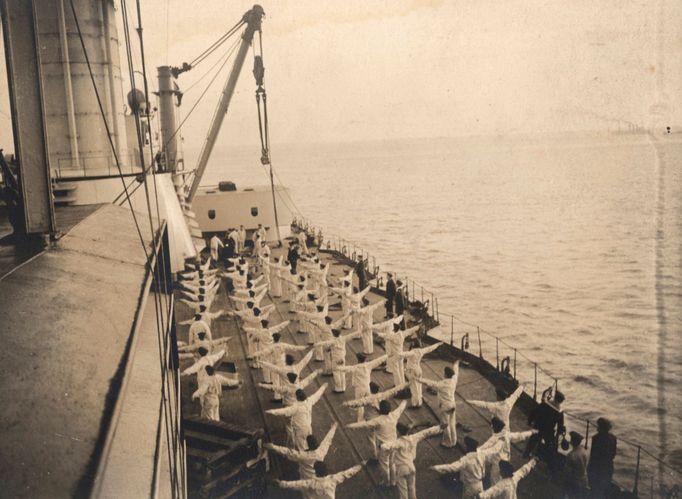 Sailors take part in morning exercises aboard a German Navy warship in this 1917 handout picture taken at an unknown location at sea.