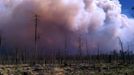 Smoke is pictured billowing from the site of wildfires at the Whitewater-Baldy Complex in southwestern New Mexico in the Gila National Forest in this May 23, 2012 handout photo obtained by Reuters May 27, 2012. The Whitewater-Baldy Complex fire, started by a lightning strike, has been burning out of control for 11 days, destroying more than 82,252 acres (33,286 hectares) and prompting officials to issue evacuation orders in nearby communities. REUTERS/U.S. Forest Servic/Handout (UNITED STATES - Tags: ENVIRONMENT DISASTER) FOR EDITORIAL USE ONLY. NOT FOR SALE FOR MARKETING OR ADVERTISING CAMPAIGNS. THIS IMAGE HAS BEEN SUPPLIED BY A THIRD PARTY. IT IS DISTRIBUTED, EXACTLY AS RECEIVED BY REUTERS, AS A SERVICE TO CLIENTS Published: Kvě. 27, 2012, 5:30 odp.